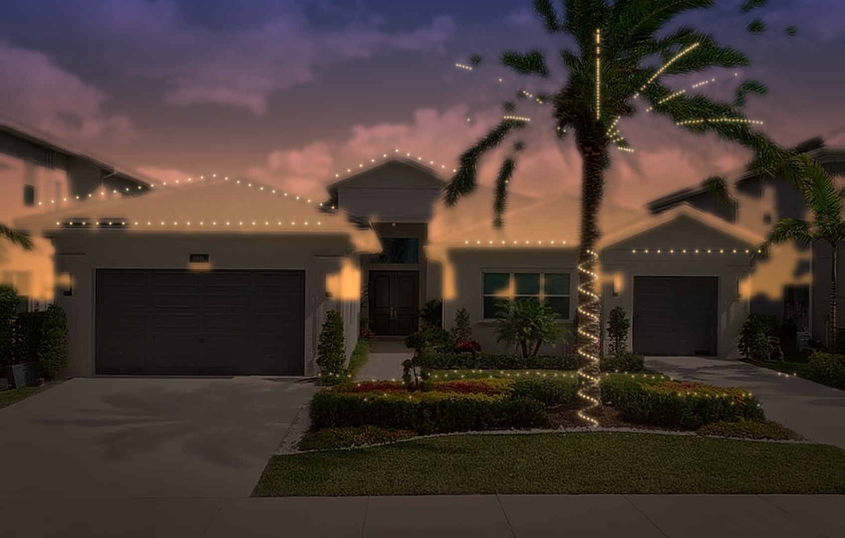 Same house lit at night